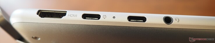 Vänster sida: HDMI 2.1, USB-C 3.1 (DP 1.3, PD), USB-C 4 (DP 1.4, PD), 3,5 mm jack (linje in/ut)